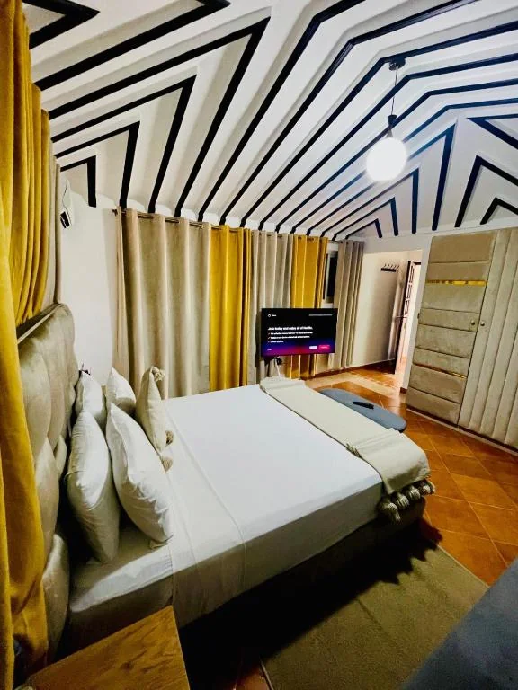 Modern bedroom at Riad Douirtna Marrakech